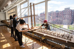 Interior Architecture students work on large model of the Pell Bridge