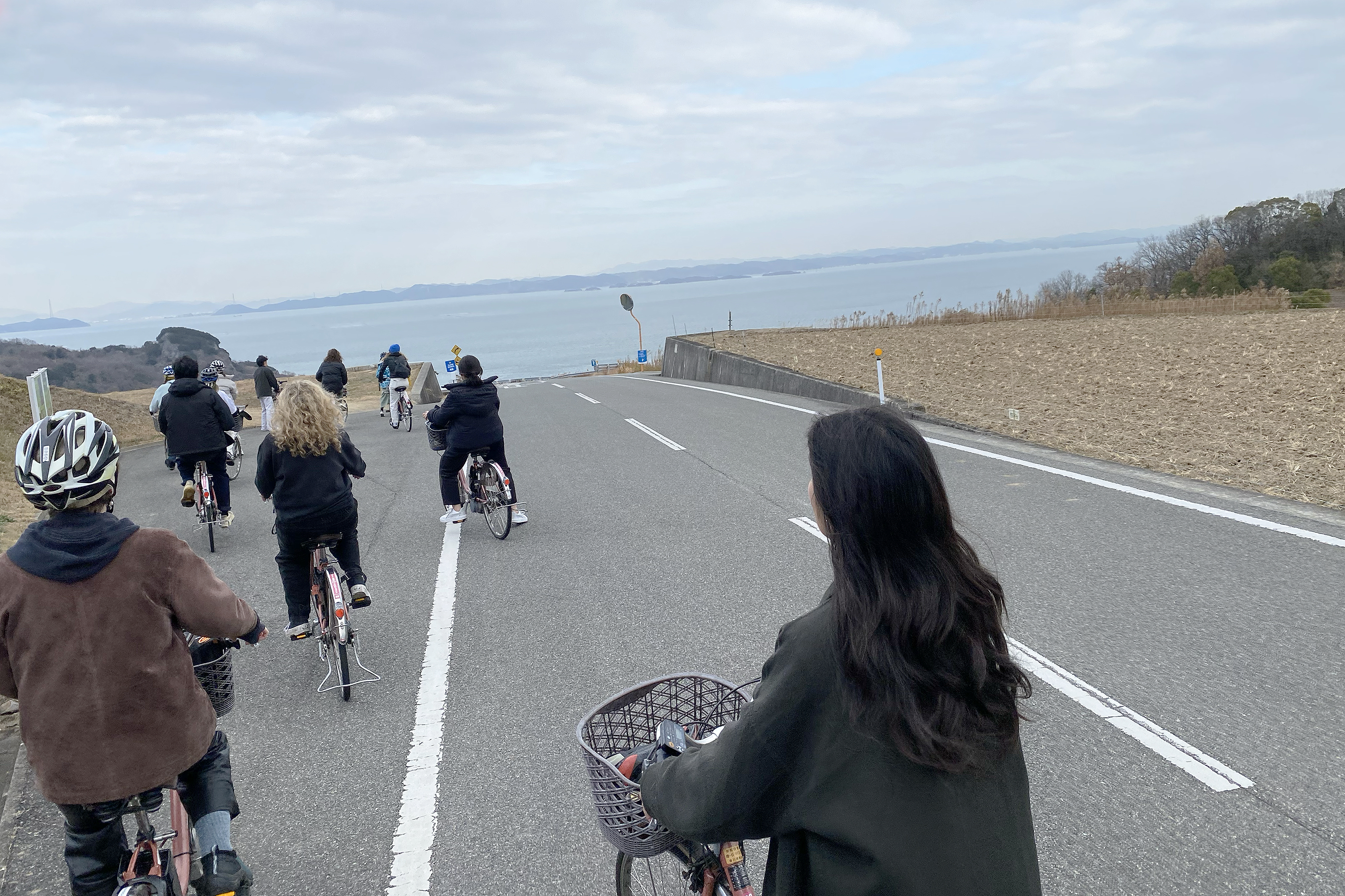 the class on a bicycle tour of Japan's art islands