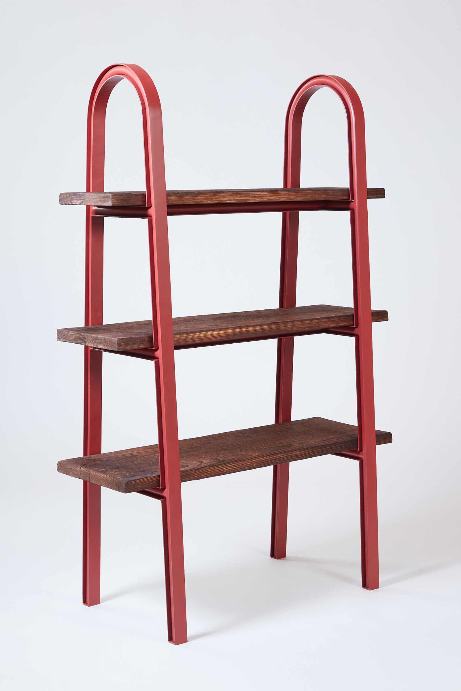 red metal bookshelves reminiscent of i-beams