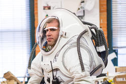 HI-SEAS crew member Andrzej Stewart in a modular space suit designed by students Erica Kim 18 AP/ID and Kasia Matlak MID 17