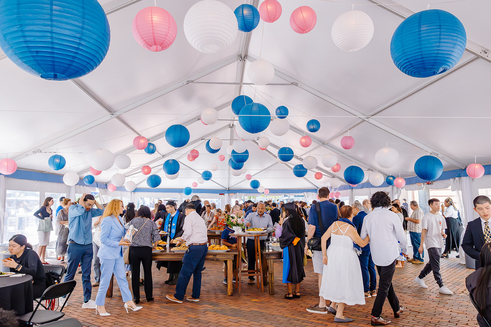 after-ceremony lunch in Market Square with blue, pink and white paper lanterns above