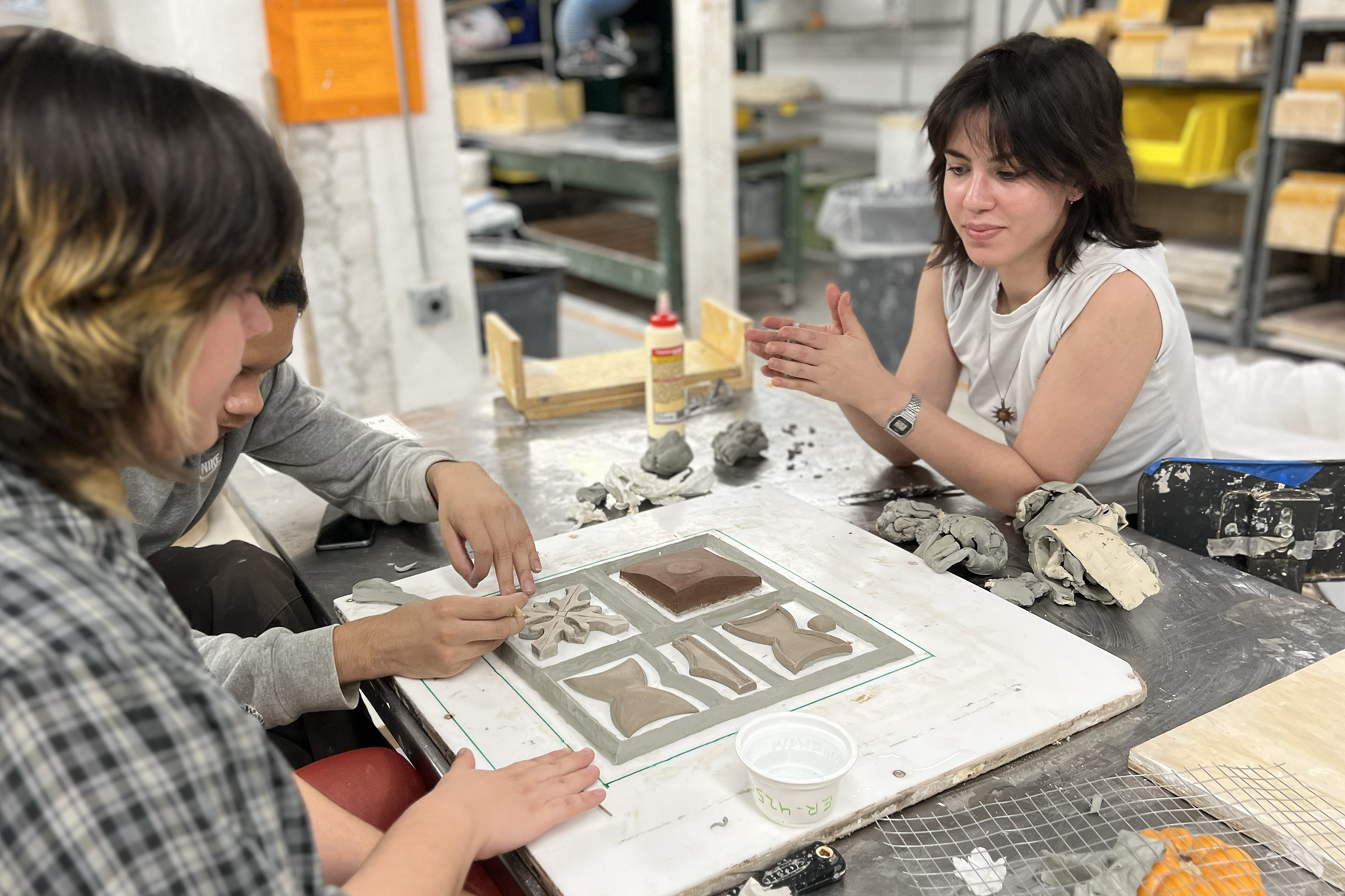 students collaborate on a dye in the Metcalf Building