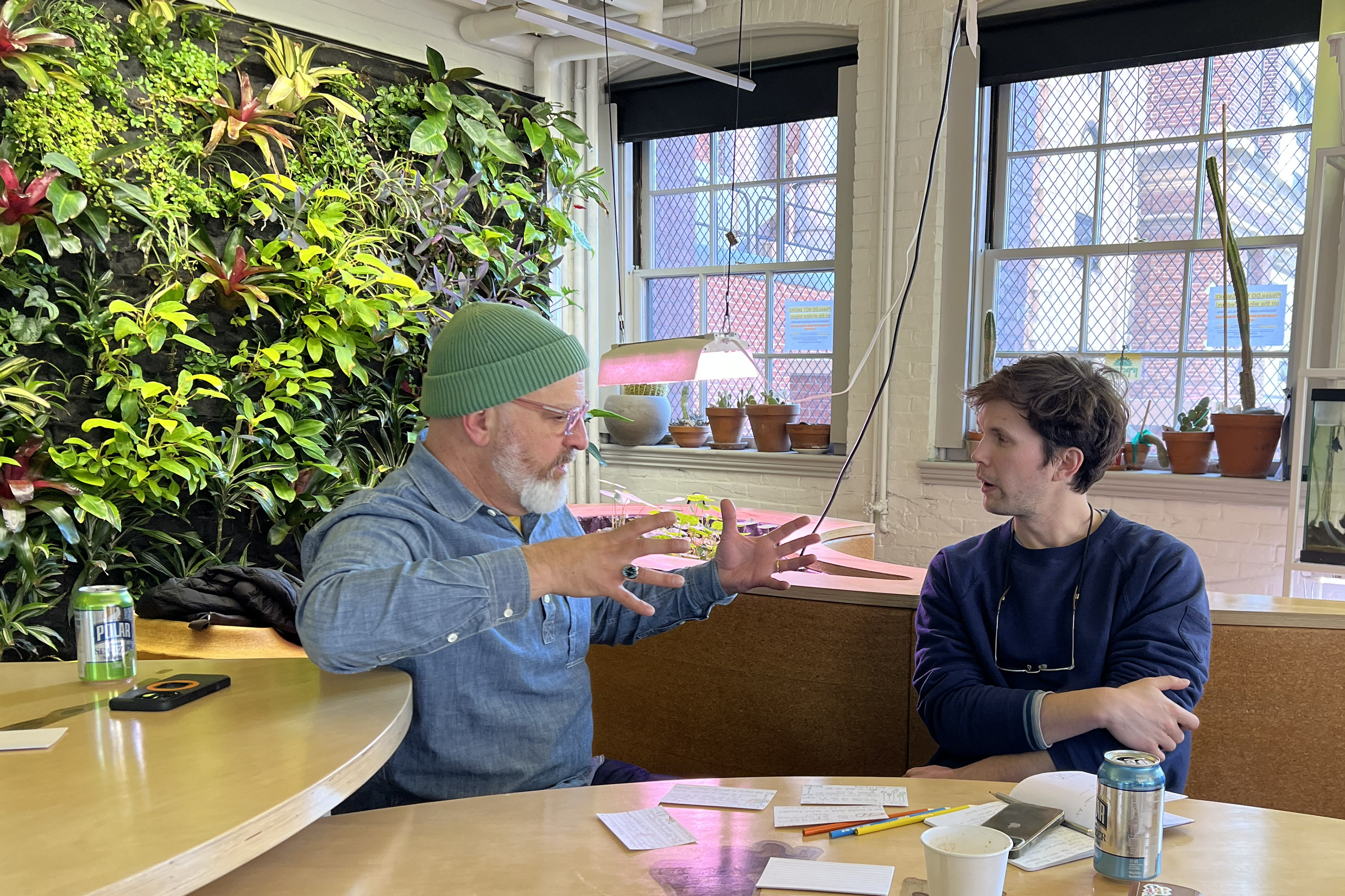 faculty member Rafael Attias brainstorms with a participant in RISD's Biodesign Makerspace