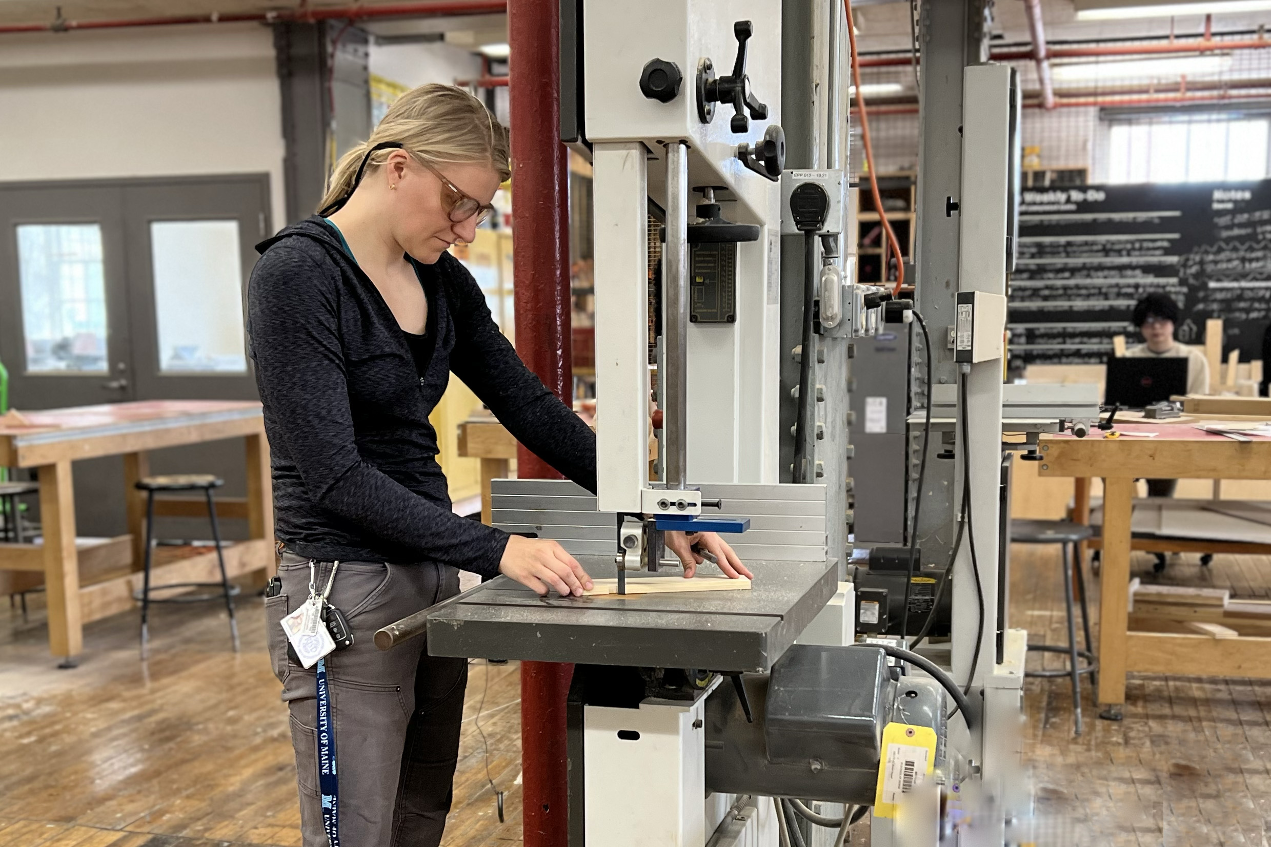 grad student Vija Lietuvninkas uses the bandsaw